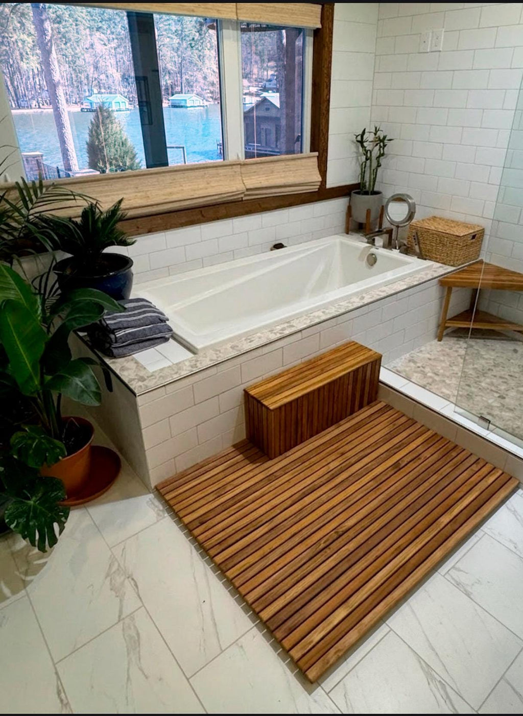 Teak corner bench built next to a tub