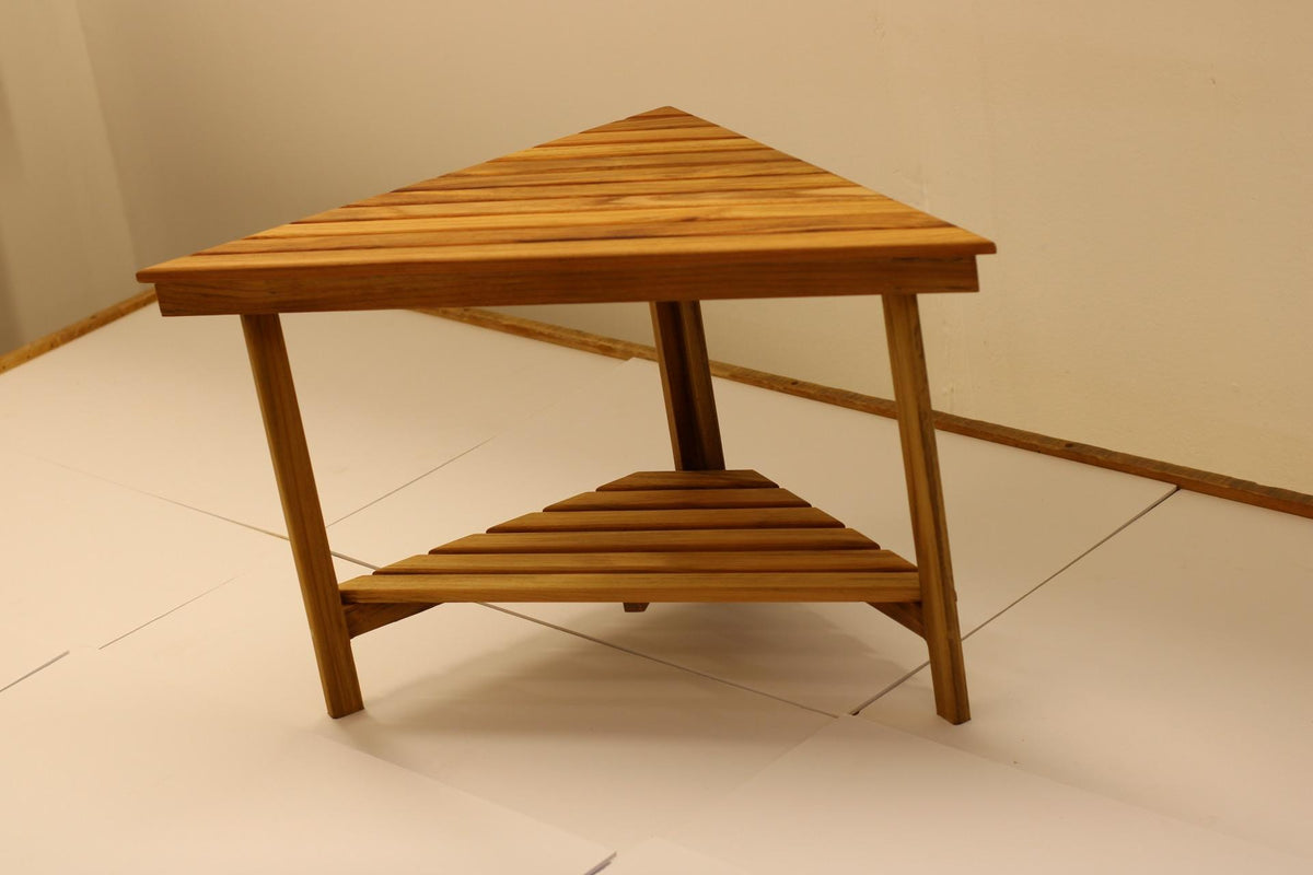 Teak corner bench built into a bathroom shower