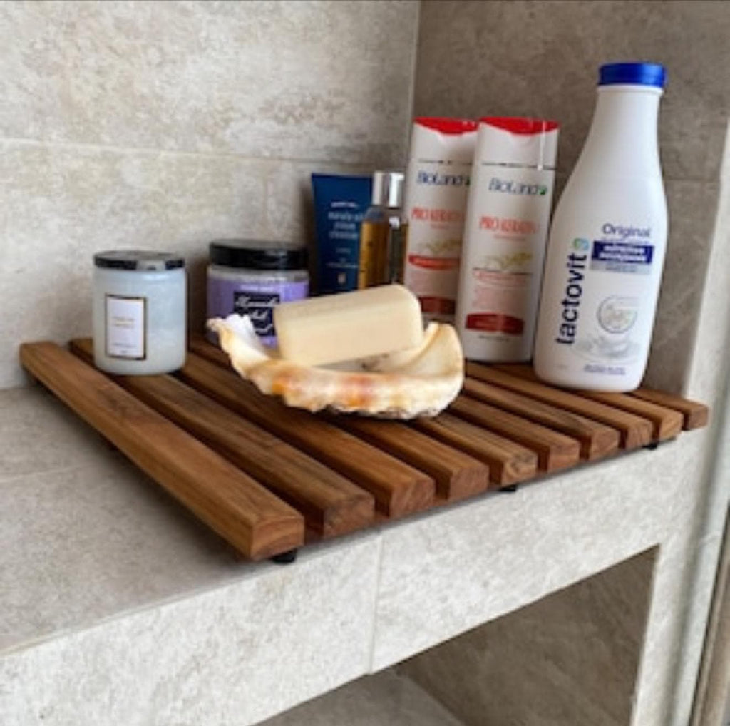 Teak dish drying rack holding soaps