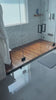 Custom-built solid teak mat with oiled finish in shower video